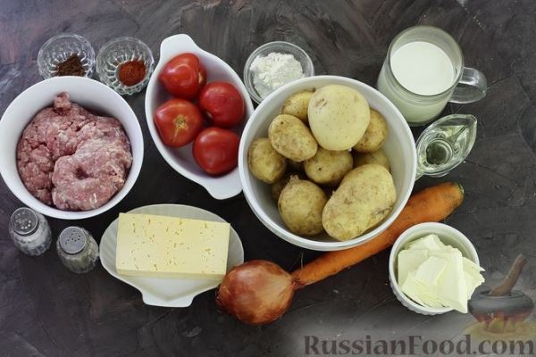 Картофельная запеканка с фаршем, помидорами, сыром и сливочным соусом